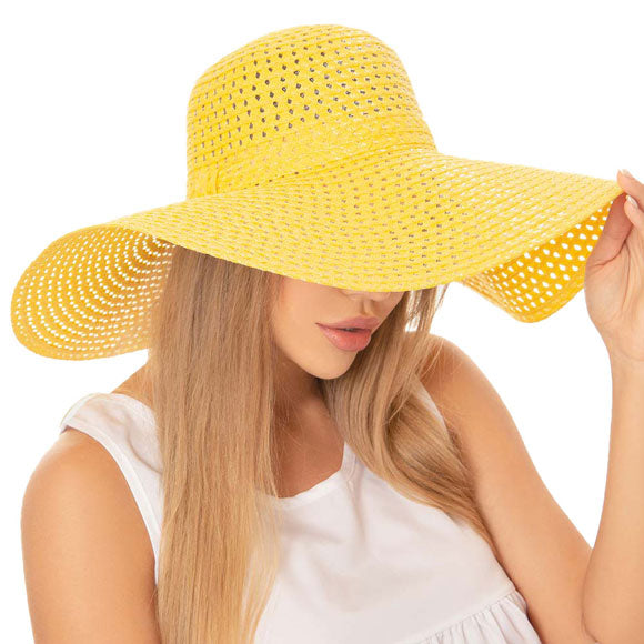 Mustard Cut Out Straw Sun Hat.  Keep your styles on even when you are relaxing at the pool or playing at the beach. Large, comfortable, and perfect for keeping the sun off of your face, neck, and shoulders Perfect summer, beach accessory. Ideal for travellers who are on vacation or just spending some time in the great outdoors.
