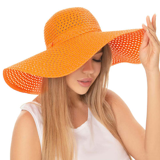 Orange Cut Out Straw Sun Hat.  Keep your styles on even when you are relaxing at the pool or playing at the beach. Large, comfortable, and perfect for keeping the sun off of your face, neck, and shoulders Perfect summer, beach accessory. Ideal for travellers who are on vacation or just spending some time in the great outdoors.
