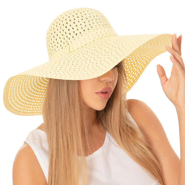 Yellow  Cut Out Straw Sun Hat.  Keep your styles on even when you are relaxing at the pool or playing at the beach. Large, comfortable, and perfect for keeping the sun off of your face, neck, and shoulders Perfect summer, beach accessory. Ideal for travellers who are on vacation or just spending some time in the great outdoors.
